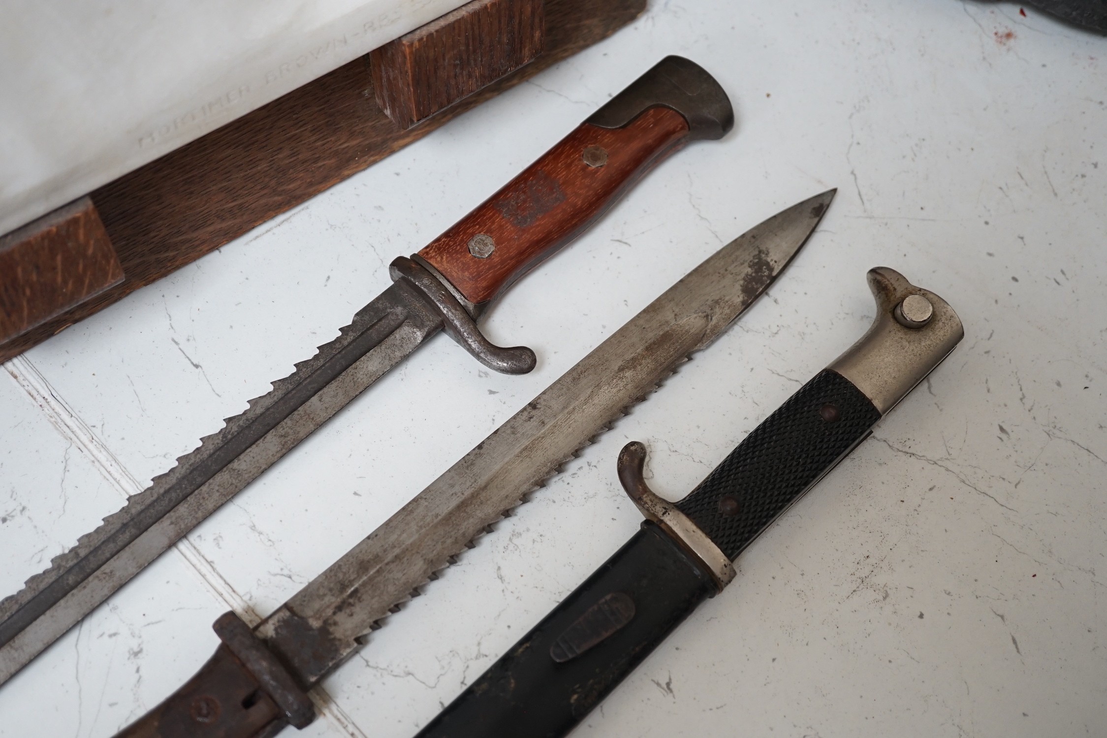 Three German bayonets including two saw-back pioneers